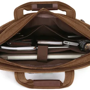 Borsa per laptop da lavoro in tela marrone spaziosa con scomparti e manici in pelle resistenti.