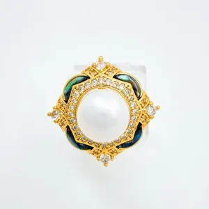 Detailed close-up of exquisite pearl clover ring accessory with pavé stones and shell.