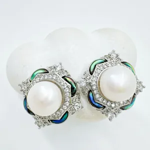 Elegant pearl stud earrings featuring micro-pave crystals and colorful shell accents for women.