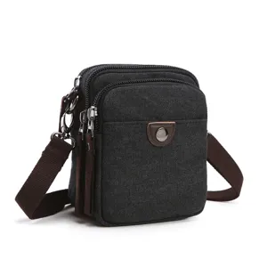 Black canvas cross-body bag multi-compartment casual shoulder bag main product view