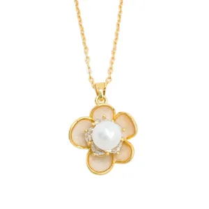 Exquisite gold plated camellia freshwater pearl pendant necklace for elegant women daily wear.