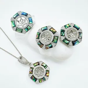 Hexagonal mother-of-pearl jewelry set detail, stylish DIY necklace pendant ring and earrings.