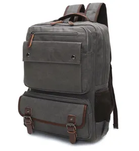 Grey canvas laptop backpack with multiple storage pockets for daily travel and school use.