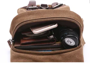 Casual canvas chest bag with multiple compartments, vintage style sling backpack for travel.