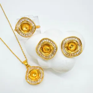Gold plated geometric jewelry blank setting detail view, pendant ring and earring accessories.