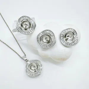 Detailed view of geometric jewelry blank set including ring, earrings, and pendant mount.