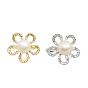 Elegant pearl flower rings set featuring sparkling cubic zirconias in gold and silver tones.