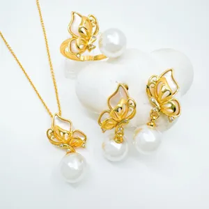 Elegant butterfly pearl jewelry set with mother of pearl and gold plated brass necklace rings.