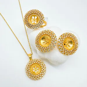 Detailed view of gold-plated diy jewelry empty settings with sparkling cubic zirconia stones.