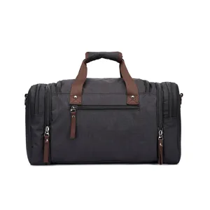 Grande borsa da viaggio comoda in tela impermeabile grigio scuro con manici marroni.