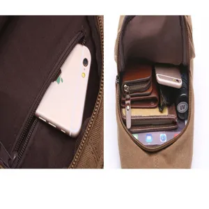 Canvas sling bag interior detail showing multi-compartment storage capacity for daily essentials.