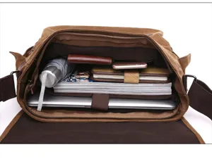 Canvas messenger bag interior capacity detail showing laptop and daily items storage
