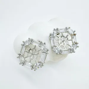 Exquisite geometric square rhinestone ear studs with delicate hollow flower design details.