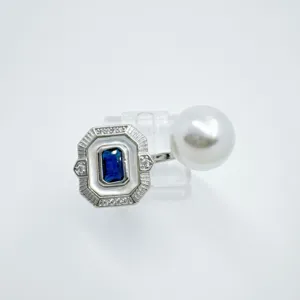 Vintage retro DIY pearl ring featuring rectangular blue gemstone and pearl decor.
