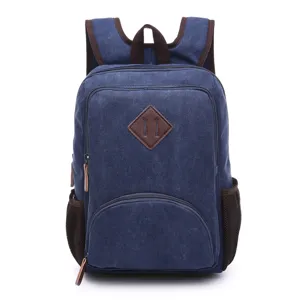 Zaino in tela blu per studenti, borsa da viaggio casual per la scuola con toppa in pelle e tasche.