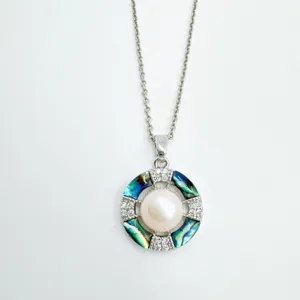 Pearl pendant necklace with geometric circular design, colorful shell and sparkling zirconia.