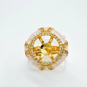 DIY gold-tone ring blank setting with sparkling cubic zirconia and geometric wheel design.
