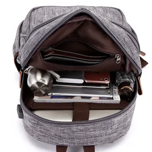 Zaino per laptop grigio impermeabile da uomo con porta USB grande capacità per la scuola.