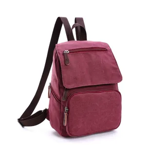 Durable canvas backpack for men and women, casual school bookbag with sturdy shoulder straps.