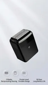 Detail view of the compact 5-blade electric shaver with black finish and powerful cutting system.