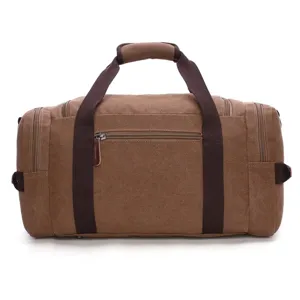 Vintage brown canvas travel duffel bag large capacity shoulder luggage bag for daily use main view