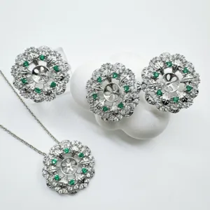 Set di gioielli floreali in argento montature vuote con pietre bianche e verdi brillanti pendenti
