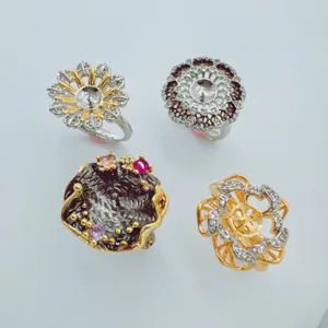 Exquisite multi-style jewelry rings set featuring elegant floral and modern artistic designs.