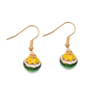Charming 3D orange fruit dangle earrings in KC gold finish with vibrant enamel colors.