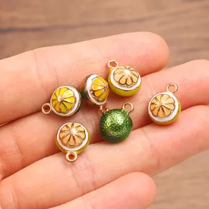 Detailed view of 3D fruit orange citrus enamel charms DIY alloy jewelry making accessories.