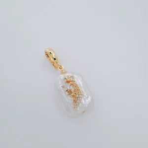 Baroque freshwater pearl pendant with gold plated celestial motif and universal clasp for DIY.