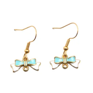 Gold-tone hook earrings featuring cute blue and white enamel bowknot charms for daily wear.