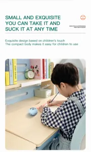 Portable mini desktop vacuum cleaner for kids, compact handheld cleaning tool for table dust.