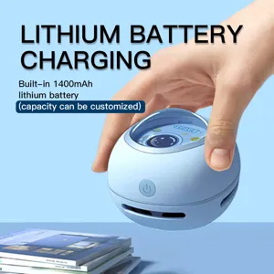 Mini desktop vacuum cleaner portable handheld cordless cleaner for student desk and home office use.