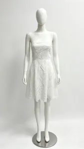 Elegant white strapless mini dress with delicate lace hollow details for women summer style.