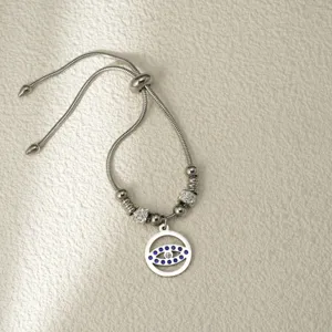 Pulsera ajustable plateada con mal de ojo, diamantes de imitación brillantes y cadena fina.
