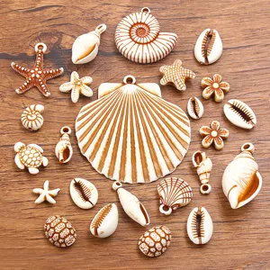 Detailed view of various acrylic sea shell and starfish charms, perfect for DIY jewelry.