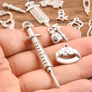 Silver medical theme charms set, syringe and stethoscope pendant for DIY jewelry making crafts.