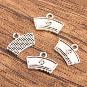 Vintage silver nurse hat metal charms for DIY jewelry making, medical themed pendants craft.