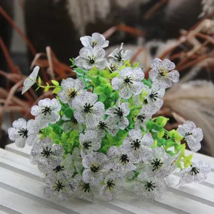 Artificial violet flower bouquet detail showing white flowers with purple veins for home decor.