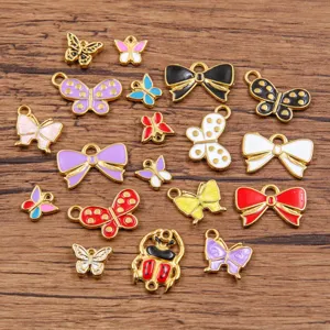 Colgantes dijes mariposa lazo esmalte oro de acero inoxidable joyas DIY detalle 13x13mm