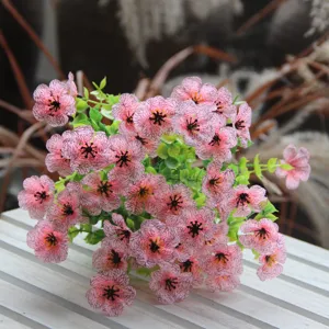 Close-up detail of artificial pink veined flower bouquet for home floral decor display.