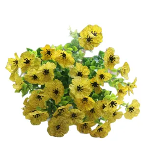 Artificial yellow flower bouquet for home decoration, fake floral arrangement for room.