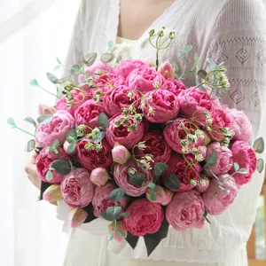Artificial pink peony bouquet for home decor and wedding arrangement, delicate flower detail.