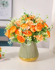 Artificial peony flower bouquet with decorative vase for home decor and wedding arrangement details.