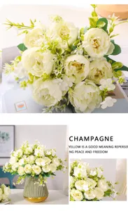 Exquisite champagne artificial peony flower bouquet with green leaves for home wedding decor.