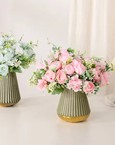 Artificial silver snow peony flower bouquet with ribbed ceramic vase for home and wedding decor.