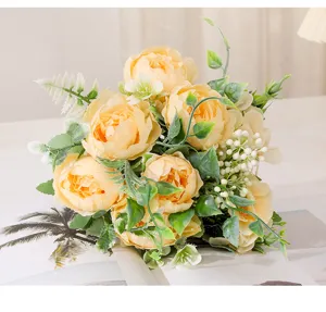 Artificial peony bouquet detail view, elegant champagne floral arrangement for home and wedding decor.