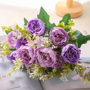Artificial purple peony flower bouquet for home decoration and wedding party setup.