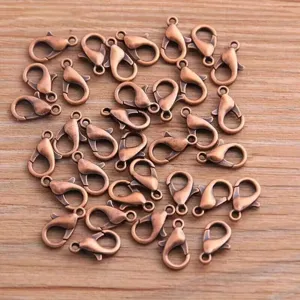 Detailed close-up shot of bronze alloy lobster clasps, perfect for DIY jewelry making and crafts.