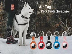 Detailed view of colorful leather protective cases with keychains, designed for tracking tags in snow.